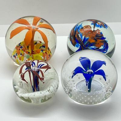 LOT 22K: Four Handlblown Floral Themed Glass Paperweights