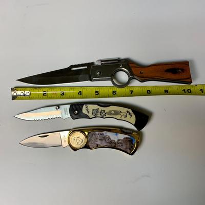 LOT 44 B: Eagle, Shotgun, Wolf Pocket Knives & More