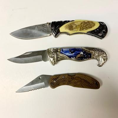 LOT 44 B: Eagle, Shotgun, Wolf Pocket Knives & More