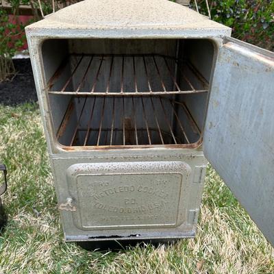 LOT 74P: Vintage The Toledo Cooker Steamer Oven, Milk Can Dispenser & Gas Cans
