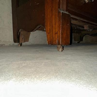 ANTIQUE 4 DRAWER CHEST WITH GLASS KNOBS ON WOODEN WHEELS