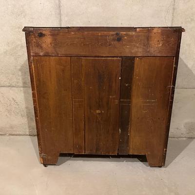 ANTIQUE 4 DRAWER CHEST WITH GLASS KNOBS ON WOODEN WHEELS