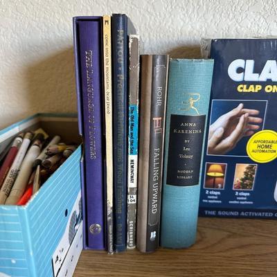 ACCO DESK, BOOKS, DVDS, THE CLAPPER, SMALL BOX OF WRITING UTENSILS, SCRAPBOOK, SCRABBLE BOARD GAME, ROCKIES CLIPBOARD AND POWER SURGE...