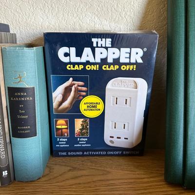 ACCO DESK, BOOKS, DVDS, THE CLAPPER, SMALL BOX OF WRITING UTENSILS, SCRAPBOOK, SCRABBLE BOARD GAME, ROCKIES CLIPBOARD AND POWER SURGE...