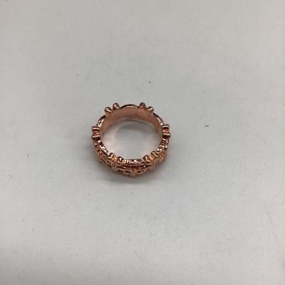 Rose gold colored flowers ring
