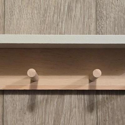 Shelf with Pegs for Hanging Items