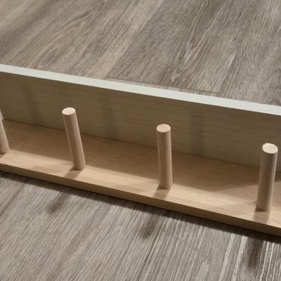 Shelf with Pegs for Hanging Items