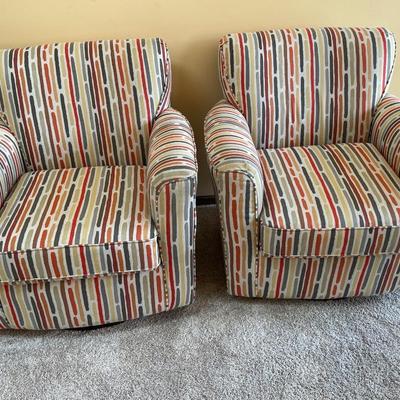 2 Striped swivel multi color chairs