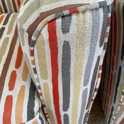 2 Striped swivel multi color chairs