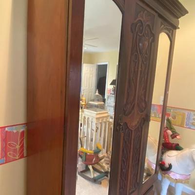 Antique Ornately Carved Armoire