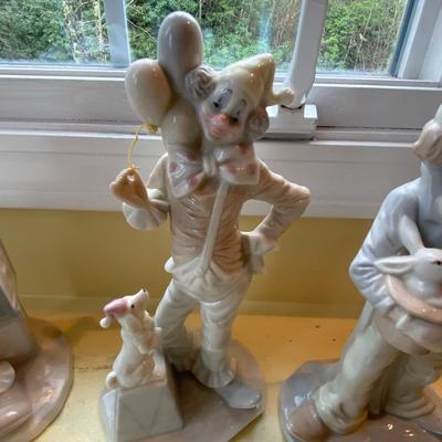 Lot of Seven Clowns Figurines