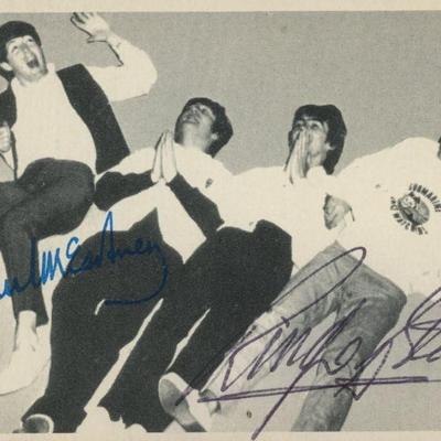 The Beatles signed trading card. GFA Authenticated