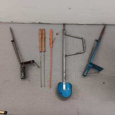 ICE FISHING POLES AND AUGER SHOVEL PLUS 2 FISHING POLE HOLDERS
