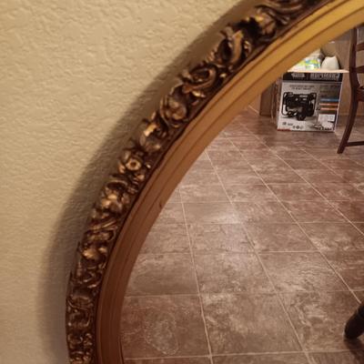 WOODEN FRAMED OVAL WALL MIRROR AND SOLID WOODEN ARMED CHAIR