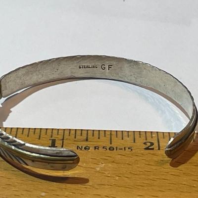 Vintage Native American Sterling Silver & Brass Wire Cuff Bracelet in Good Preowned Condition. (Size for a 6.5" Wrist).