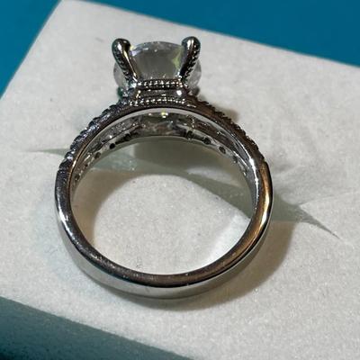 Vintage Silver-toned Fashion CZ Engagement Style Ring w/Center CZ Stone Measuring about 2-Carats in VG Preowned Condition.