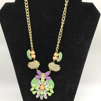 Multi colored vintage earrings and necklace