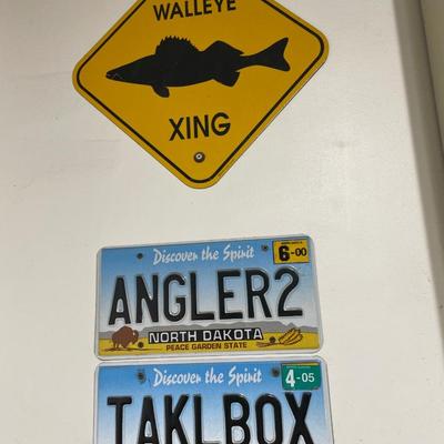Fishing license plates and walleye crossing sign