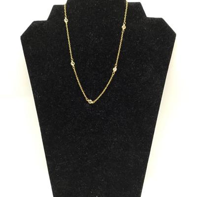 Gold toned necklace with rhinestone