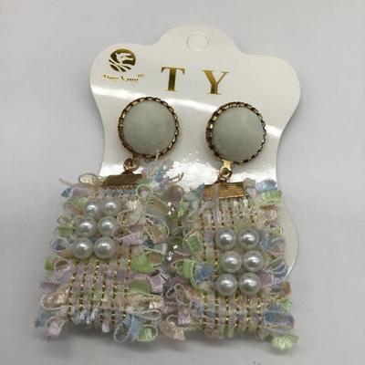 Ting Yang designed earrings