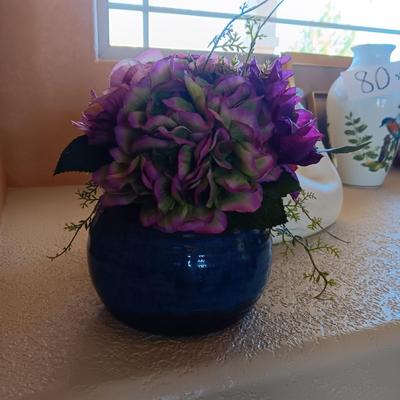 WOODEN SWAN AND SILK FLOWERS IN A PLANTER