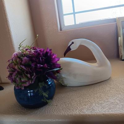 WOODEN SWAN AND SILK FLOWERS IN A PLANTER