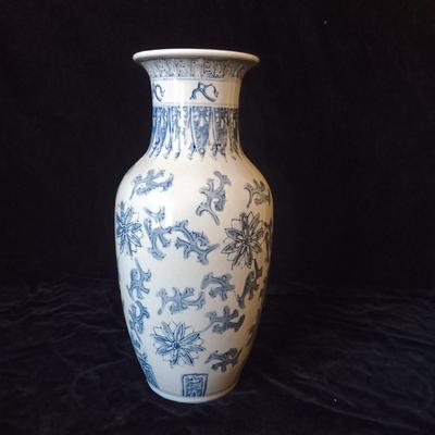 BLUE AND WHITE VASE AND PAIR OF CANDLE HOLDERS