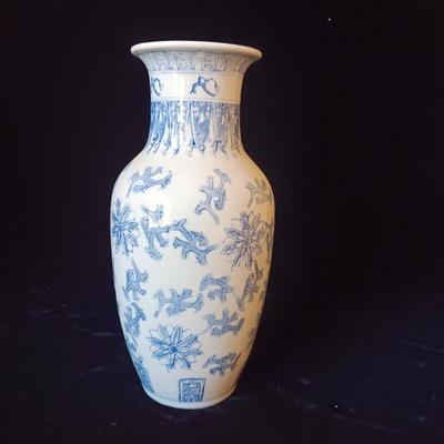 BLUE AND WHITE VASE AND PAIR OF CANDLE HOLDERS