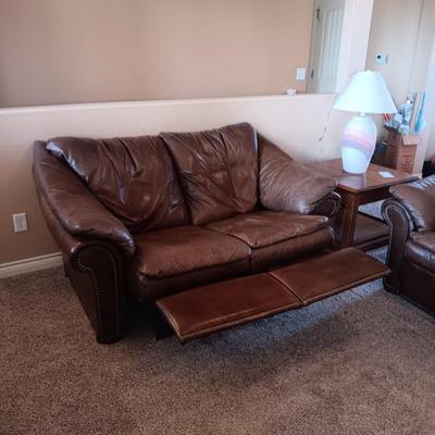 LEATHER RECLINING SOFA AND LOVESEAT WITH NAILHEAD ACCENTS