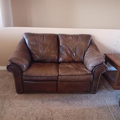 LEATHER RECLINING SOFA AND LOVESEAT WITH NAILHEAD ACCENTS
