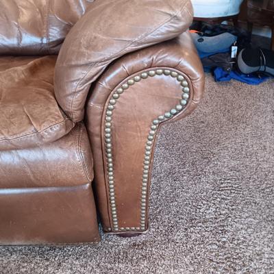 LEATHER RECLINING SOFA AND LOVESEAT WITH NAILHEAD ACCENTS