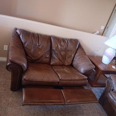 LEATHER RECLINING SOFA AND LOVESEAT WITH NAILHEAD ACCENTS