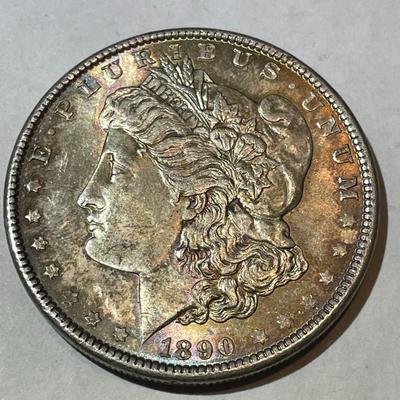1890-P NICE ORIGINAL TONED UNCIRCULATED MORGAN SILVER DOLLAR AS PICTURED.