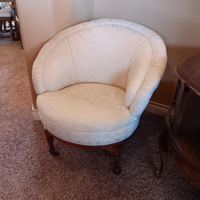 IVORY UPHOLSTERED CHAIR ON CASTERS, 2 TIER END TABLE AND FOOT STOOL