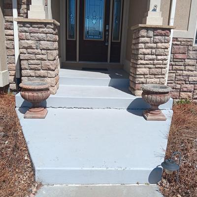 PAIR OF CEMENT FLOWER POTS