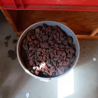 5 GALLON BUCKET PLUS CRATE OF LAVA ROCK