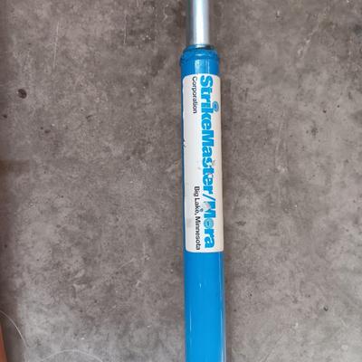 ICE FISHING HAND AUGER AND 2 POLAR II FISHING POLES