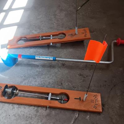 ICE FISHING HAND AUGER AND 2 POLAR II FISHING POLES