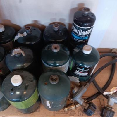 PROPANE CANS AND PRESSURE REGULATORS
