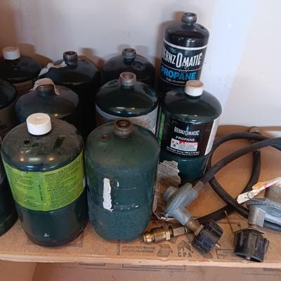 PROPANE CANS AND PRESSURE REGULATORS