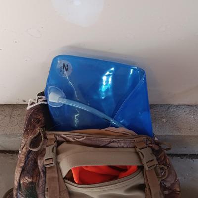 CABELAS CAMO BACKPACK FILLED WITH MANY ESSENTIALS