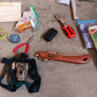 CABELAS CAMO BACKPACK FILLED WITH MANY ESSENTIALS