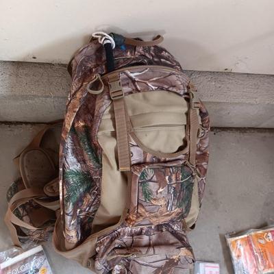 CABELAS CAMO BACKPACK FILLED WITH MANY ESSENTIALS