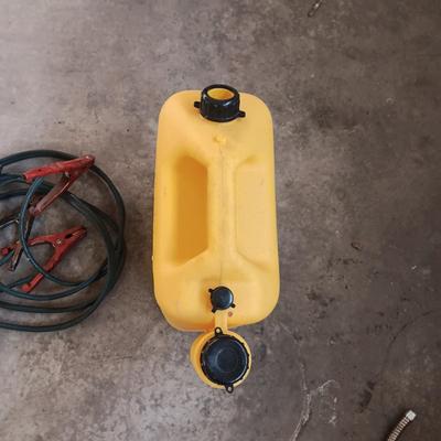 AUTO JUMPER CABLES AND A PLASTIC DIESEL FUEL CARRIER