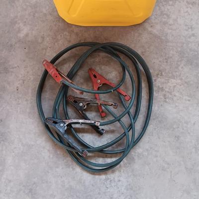 AUTO JUMPER CABLES AND A PLASTIC DIESEL FUEL CARRIER