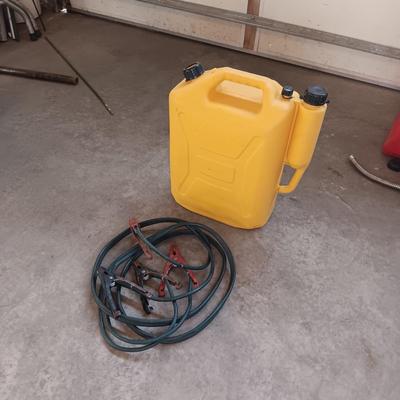 AUTO JUMPER CABLES AND A PLASTIC DIESEL FUEL CARRIER