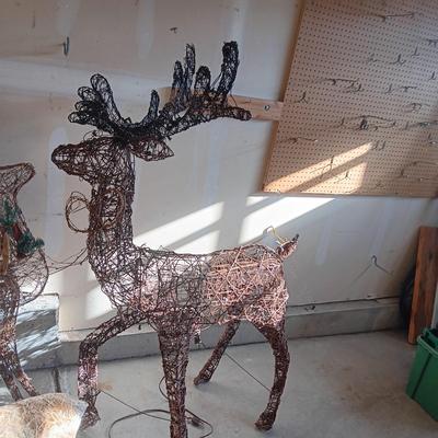 LIGHTED AND MOTION YARD REINDEER, NEW BALE OF HAY AND SMALLER REINDEER