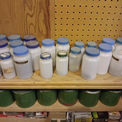 TIN CANS AND PLATIC BOTTLES OF ORGANIZED HARDWARE