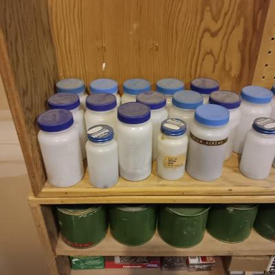 TIN CANS AND PLATIC BOTTLES OF ORGANIZED HARDWARE