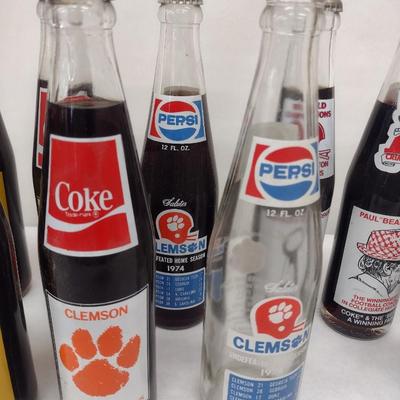 Nice Assortment of Collectible Pepsi and Coca-Cola Sports Themed Bottles Clemson, Bear Bryant, Washington Redskins, Etc.